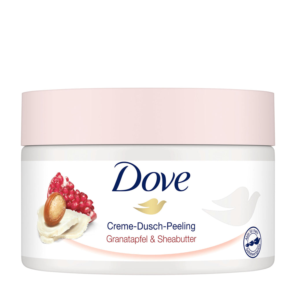 A white jar of Dove Pomegranate & Shea Butter body scrub with a light pink lid, shown on a plain white background.
