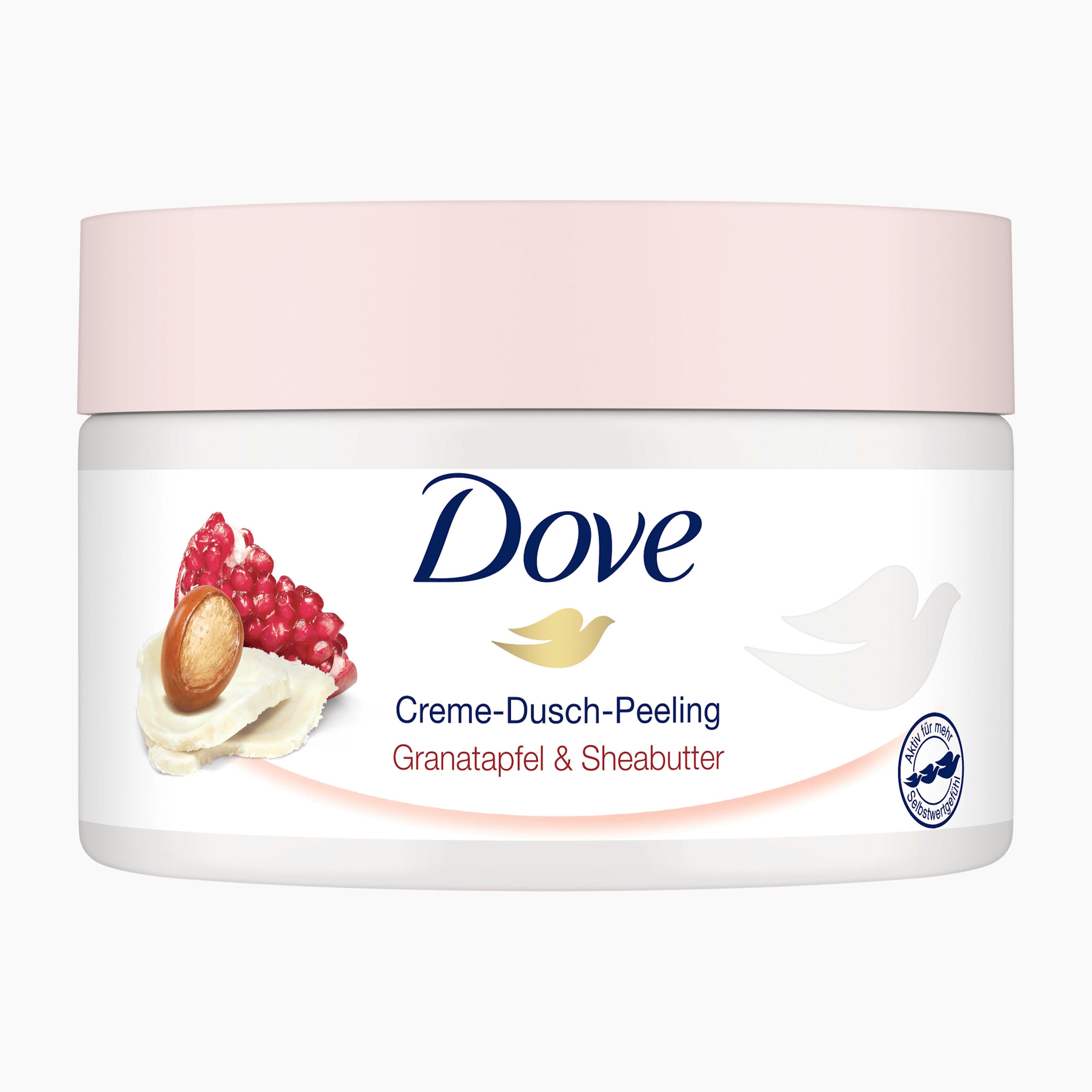 Dove Pomegranate & Shea Butter body scrub in a white jar with a light pink lid, on a light gray background.