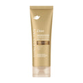 Dove Sunless Tan Summer Revived Sunkissed Glow + Pro-Ceramides Light/Medium shade Gradual Tan Lotion in a gold squeeze tube with a clear cap, shown on a plain white background.