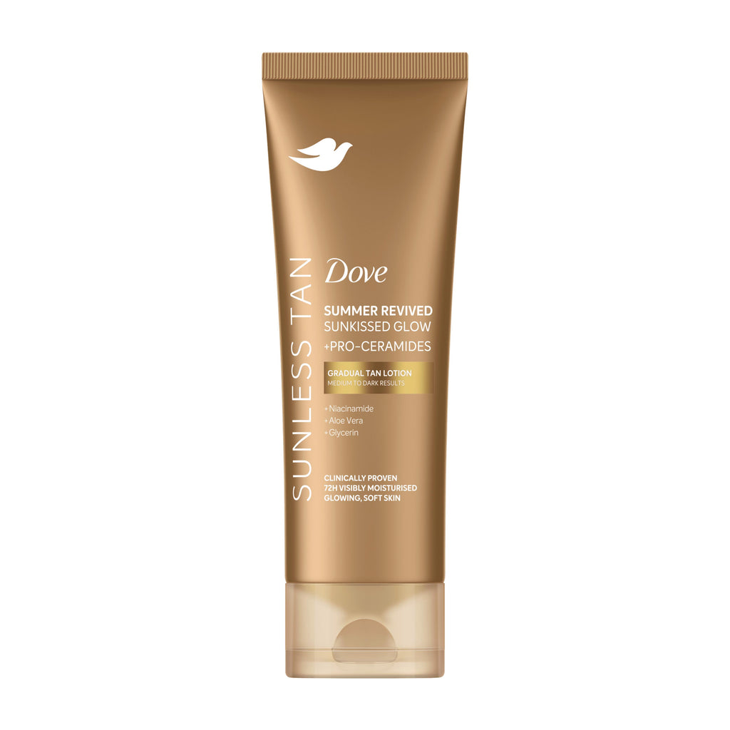 Dove Sunless Tan Summer Revived Sunkissed Glow +Pro-Ceramides Medium/Dark Gradual Tan Lotion in a metallic gold squeeze tube with a clear cap, shown on a plain white background.