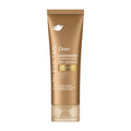 Dove Sunless Tan Summer Revived Sunkissed Glow +Pro-Ceramides Medium/Dark Gradual Tan Lotion in a metallic gold squeeze tube with a clear cap, shown on a plain white background.