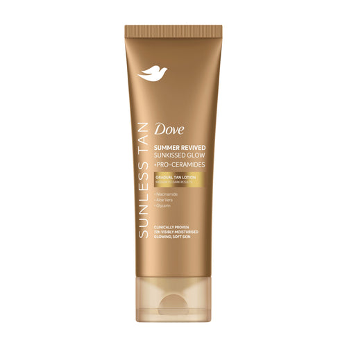 Dove Sunless Tan Summer Revived Sunkissed Glow +Pro-Ceramides Medium/Dark Gradual Tan Lotion in a metallic gold squeeze tube with a clear cap, shown on a plain white background.