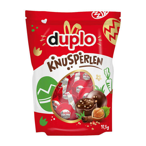 Red packaging of duplo Knusperlen with a clear window showing the product.