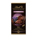 A package of Lindt Edelbitter Mousse Blueberry-Lavender dark chocolate bar, 150g, with an image of the chocolate bar, blueberries, and lavender plants.