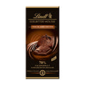 A bar of Lindt Edelbitter Mousse Chocolate-Truffle, showing a layer of dark chocolate mousse on top of a chocolate truffle, with fine dark chocolate coating the bottom.