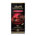 Packaging of Lindt Edelbitter Mousse Sour Cherry-Chili dark chocolate bar, displaying the product and its name, along with images of cherries and chili peppers.