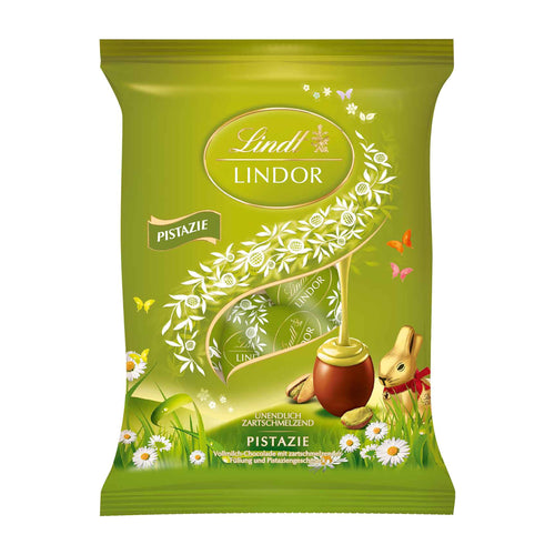 Lindt Lindor Pistachio Eggs chocolate pralines packaging with a gold bunny and pistachio design on a white background