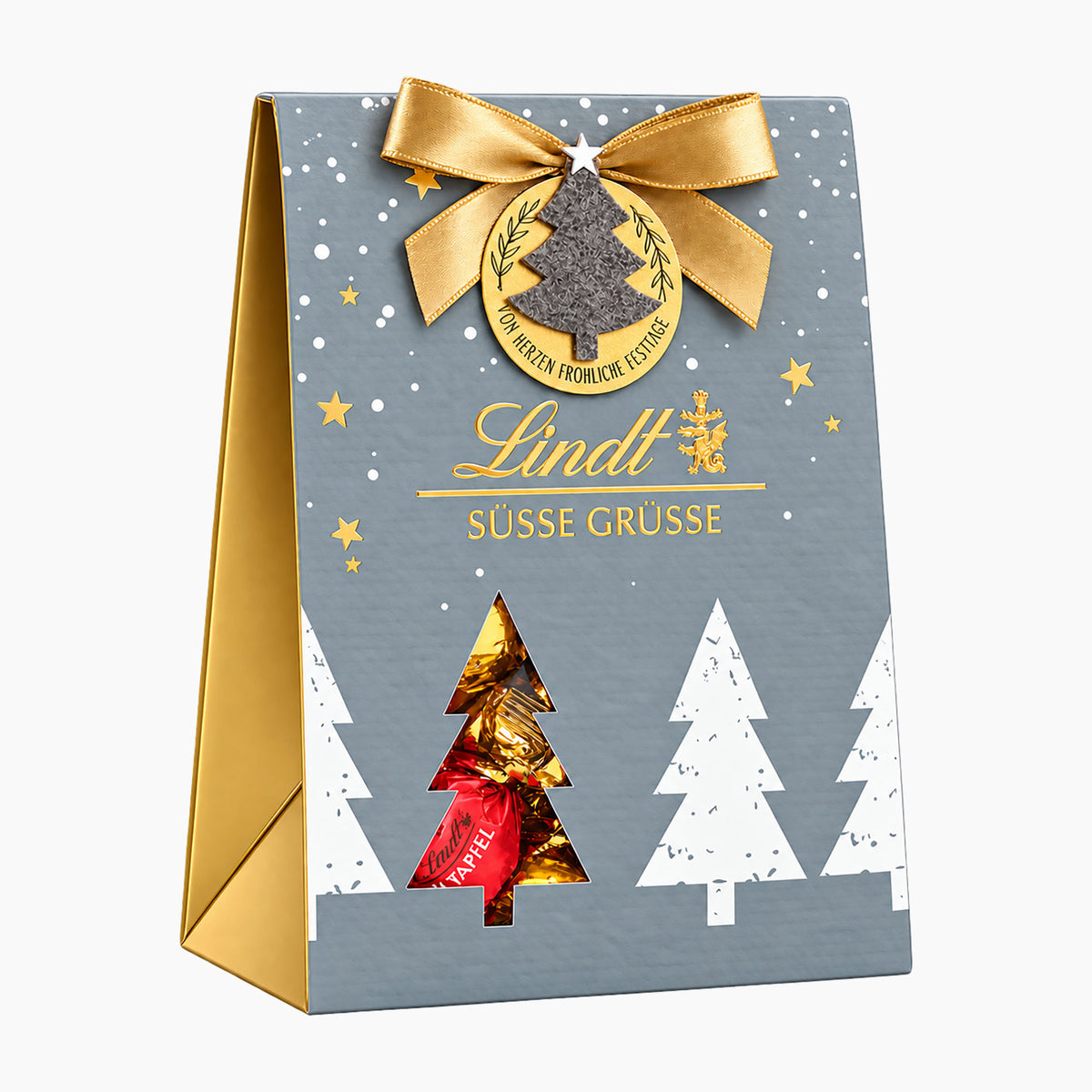 Lindt Felt Edition pralines bag featuring a gray background with white Christmas trees, gold stars, a gold ribbon bow, and a gold foil window displaying a red wrapped Lindt chocolate.