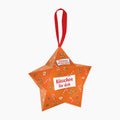 A Ferrero Kusschen Christmas star-shaped chocolate box ornament in orange, decorated with festive illustrations and a red hanging ribbon, shown on a plain white background.