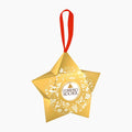 A gold star-shaped Ferrero Rocher gift ornament with a red hanging ribbon and white decorative illustrations, centered on a plain white background.