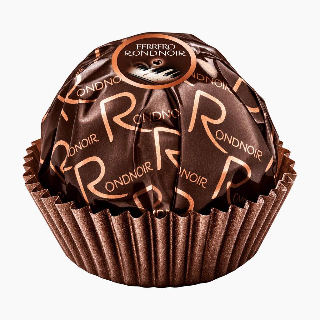 A single Ferrero Rondnoir chocolate praline in its signature foil wrapper, featuring a metallic brown design with rose gold 'RONDNOIR' lettering and a pleated brown paper base, isolated on a white background.
