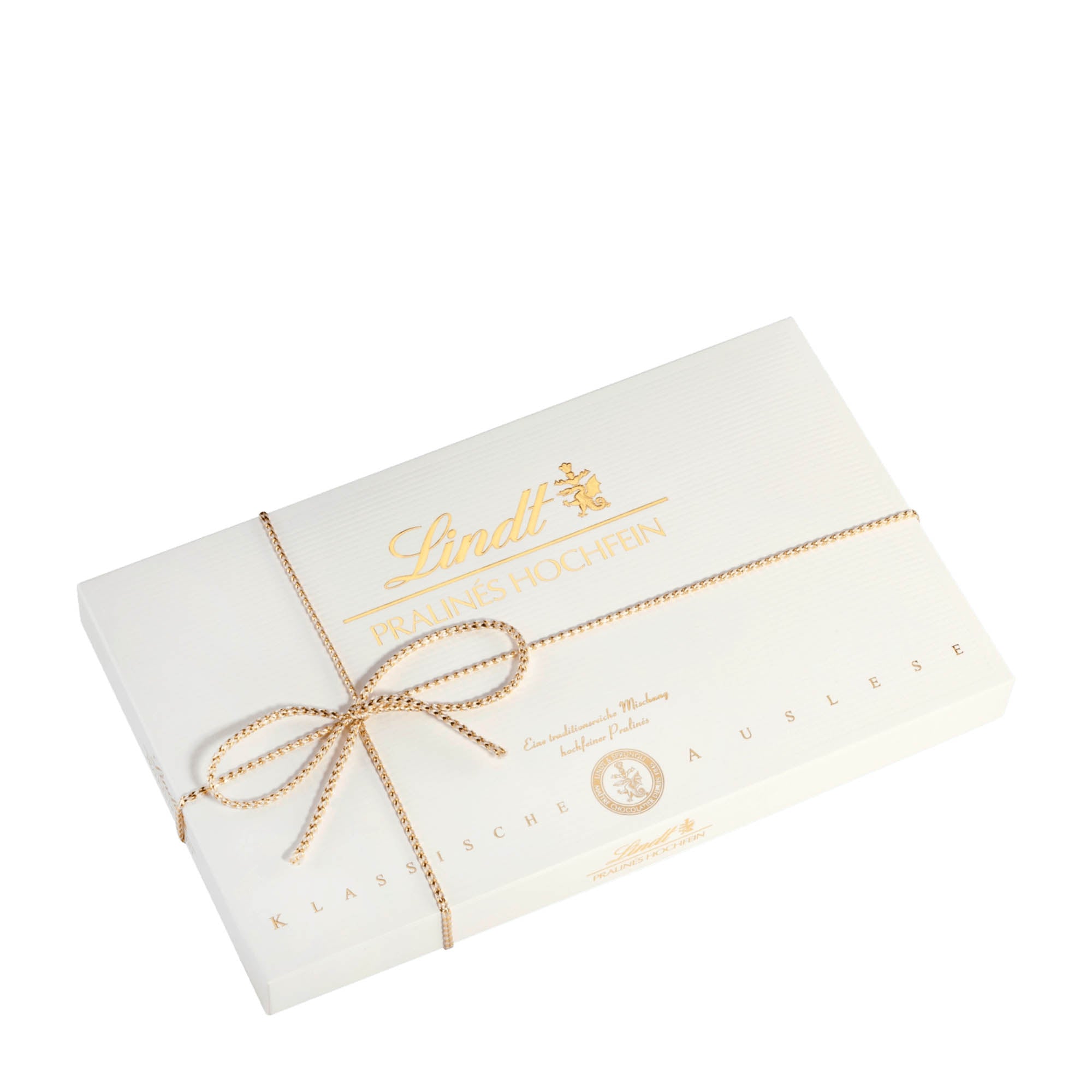 A Lindt gift box with 'Lindt Fine Pralines' text, tied with a golden ribbon.