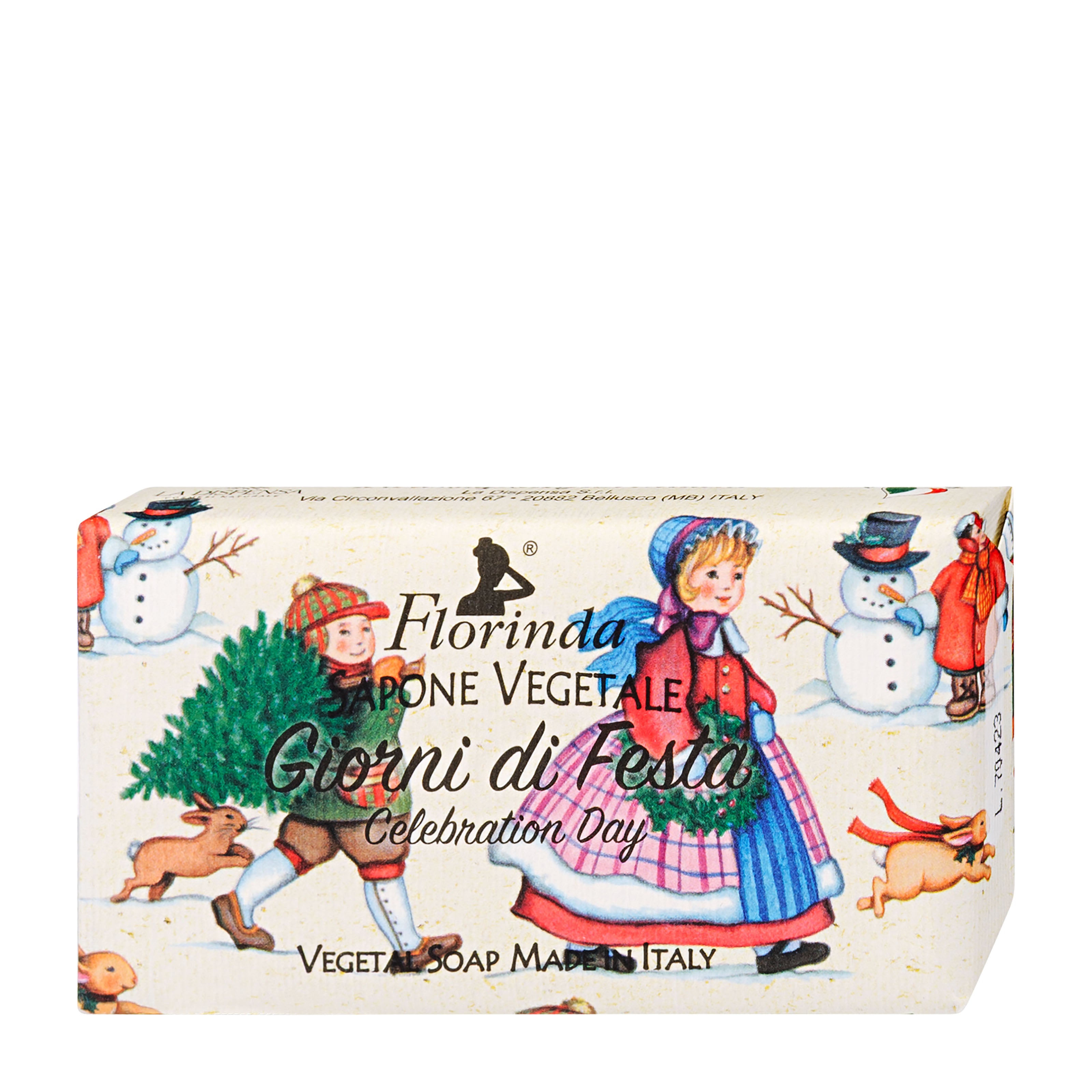 Bar of soap with festive design featuring children and snowmen on a white background