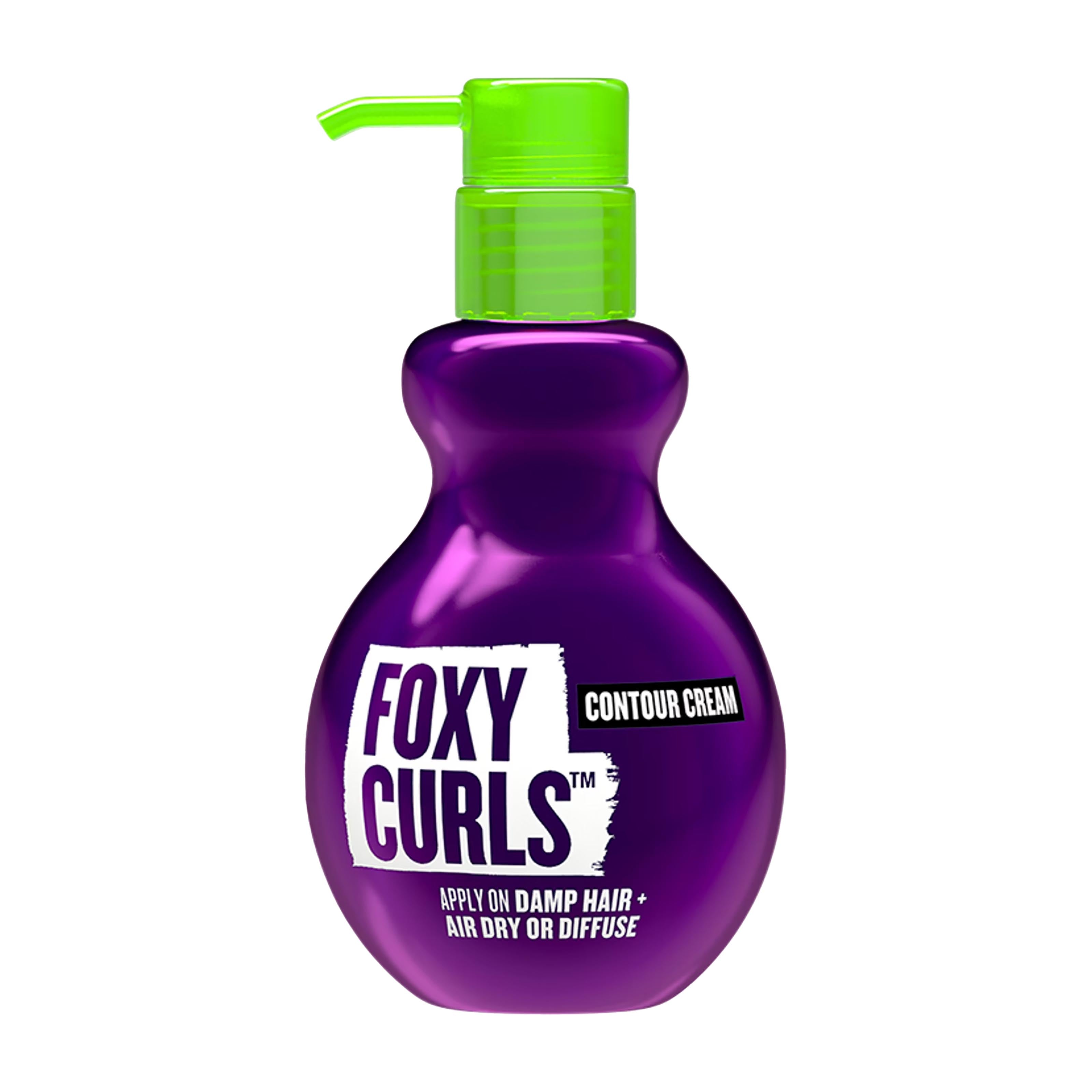 Purple bottle of Bed Head Tigi Foxy Curls Contour Cream with a green pump on a white background