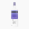 A bottle of John Frieda Frizz Ease Dream Curls Styling Spray hair smoothing treatment, featuring a white bottle with a lavender purple label and spray nozzle, set against a plain white background.