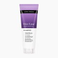 A tube of John Frieda Frizz Ease Miracle Repair Shampoo on a light gray background. The tube is purple and white with black text.