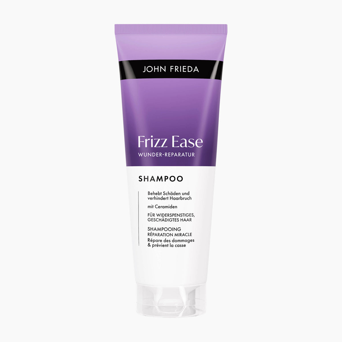 A tube of John Frieda Frizz Ease Miracle Repair Shampoo on a light gray background. The tube is purple and white with black text.