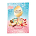 Lindt frozen yogurt mix egg pralines packaging with colorful eggs and desserts on a blue and pink background