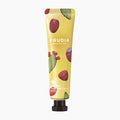Frudia My Orchard Cactus Hand Cream tube on a light gray background.