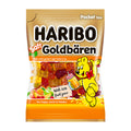 Haribo Goldbears Juicy gummy candy packaging with a cartoon bear holding a drink on a white background