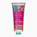 A tube of Tesori d'Oriente Ayurveda hand cream with a vibrant pink and multicolor floral pattern, set against a plain light gray background.