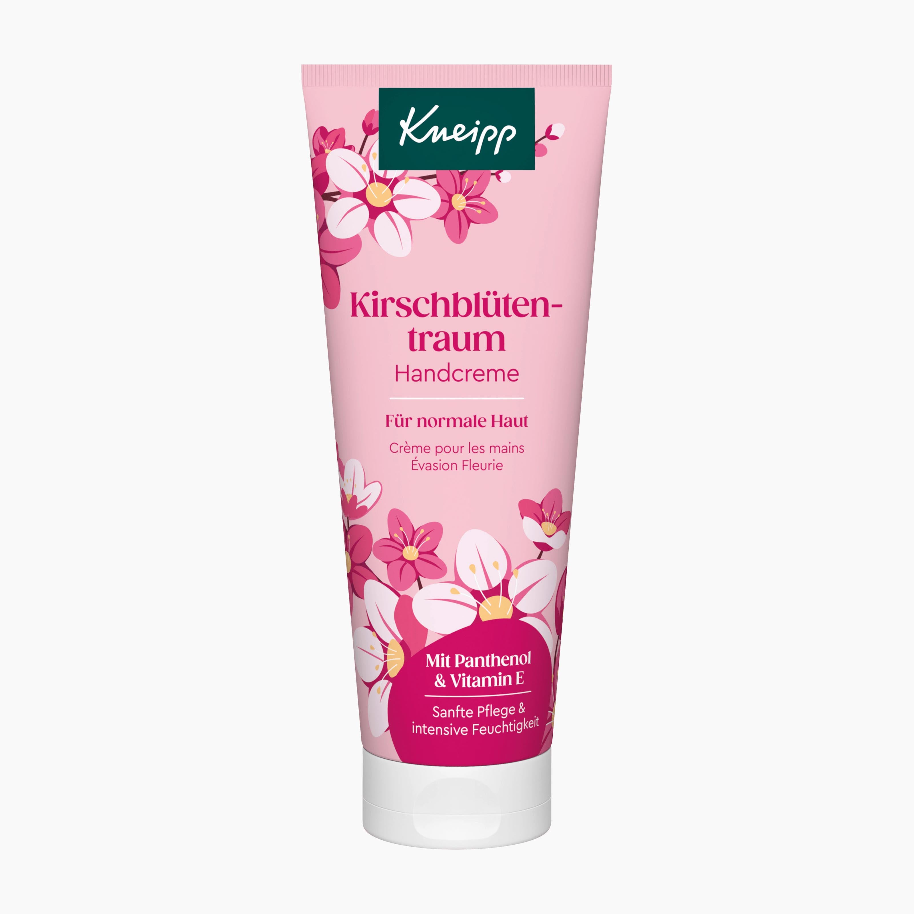 A pink squeeze tube of Kneipp Cherry Blossom Dream Hand Cream with white and pink floral illustrations, set against a plain light gray background.