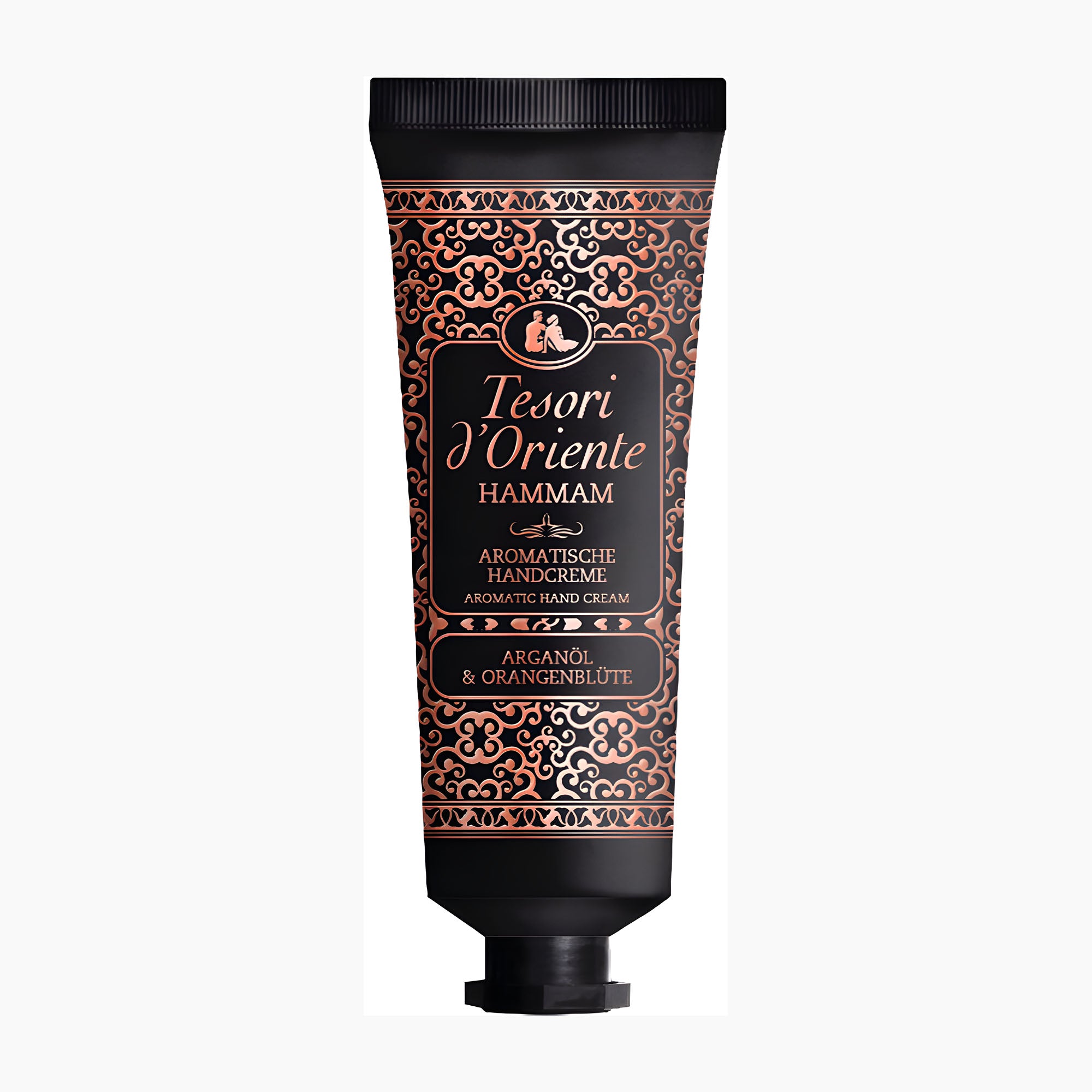 A squeeze tube of Tesori d'Oriente Hammam Aromatic Hand Cream, featuring a black body with an ornate copper and gold patterned label, on a plain white background.