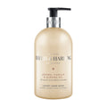 Baylis & Harding Jojoba, Vanilla & Almond Oil luxury hand wash in a gold-colored bottle with a pump dispenser.
