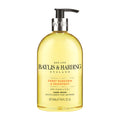 Baylis & Harding Sweet Mandarin & Grapefruit hand wash in a clear pump bottle with yellow liquid visible inside.