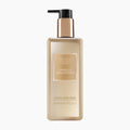 A bottle of Baylis & Harding Vanilla Seduction Luxury Hand Wash with a black pump and a metallic gold cap, set against a plain white background.