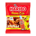 A package of Haribo Happy Cola fruit gummy candies featuring the Haribo logo and a cartoon bear on a red background.