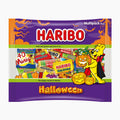 A package of Haribo Halloween Multipack gummy candy, featuring a purple and orange design with a cartoon bear in a cape, jack-o'-lanterns, and a collage of various Haribo candy packs.