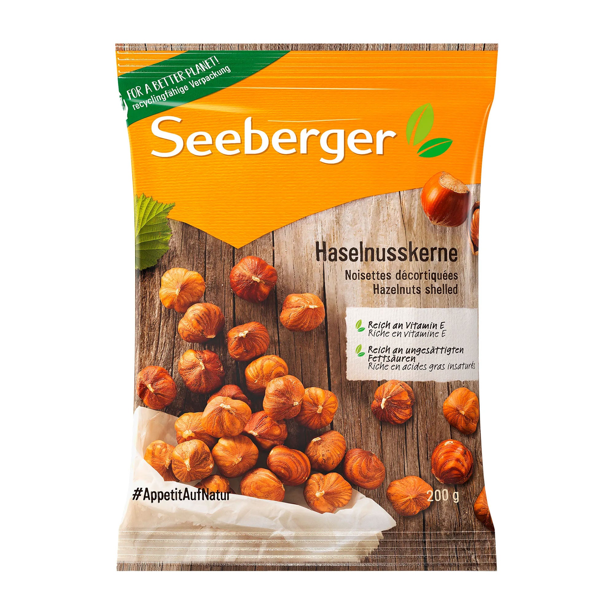 Package of Seeberger hazelnuts on a wooden surface with an orange label.