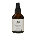 Bottle of hej organic sensitive 5% PHA spray toner on a white background