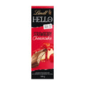 Packaging of Lindt Hello Strawberry Cheesecake milk chocolate bar, showing the bar and strawberry pieces with the text 'Strawberry Cheesecake' and the weight '100g'.