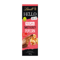 Packaging of Lindt Hello Vegan Sweet & Salty Popcorn chocolate bar, showing the bar and the popcorn pieces, with the Lindt logo and the 'vegan' label.