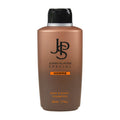 A bottle of John Player Special Homme hair and body shampoo with a capacity of 500 mL. The bottle is predominantly brown with white and orange text displaying the brand and product name.