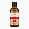 An amber glass bottle of Coconutoil Cosmetics Bio Intim & Massage Oil with a black cap and a brown and white label, shown on a light gray background.