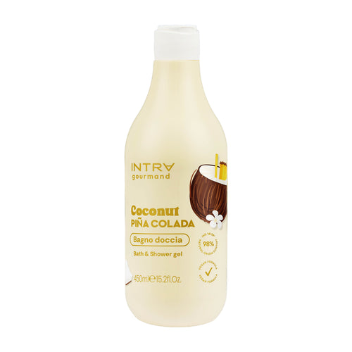 A bottle of INTRA gourmand Coconut Pina Colada Bath & Shower gel, featuring a cream-colored bottle with a white cap and a label showing a coconut illustration.