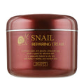 Brown jar of Jigott snail repairing cream with gold text on a white background