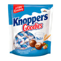 Packaging for Knoppers Goodies chocolate wafer balls, showing the product name, images of the wafer balls, milk chocolate pieces, and a glass of milk.