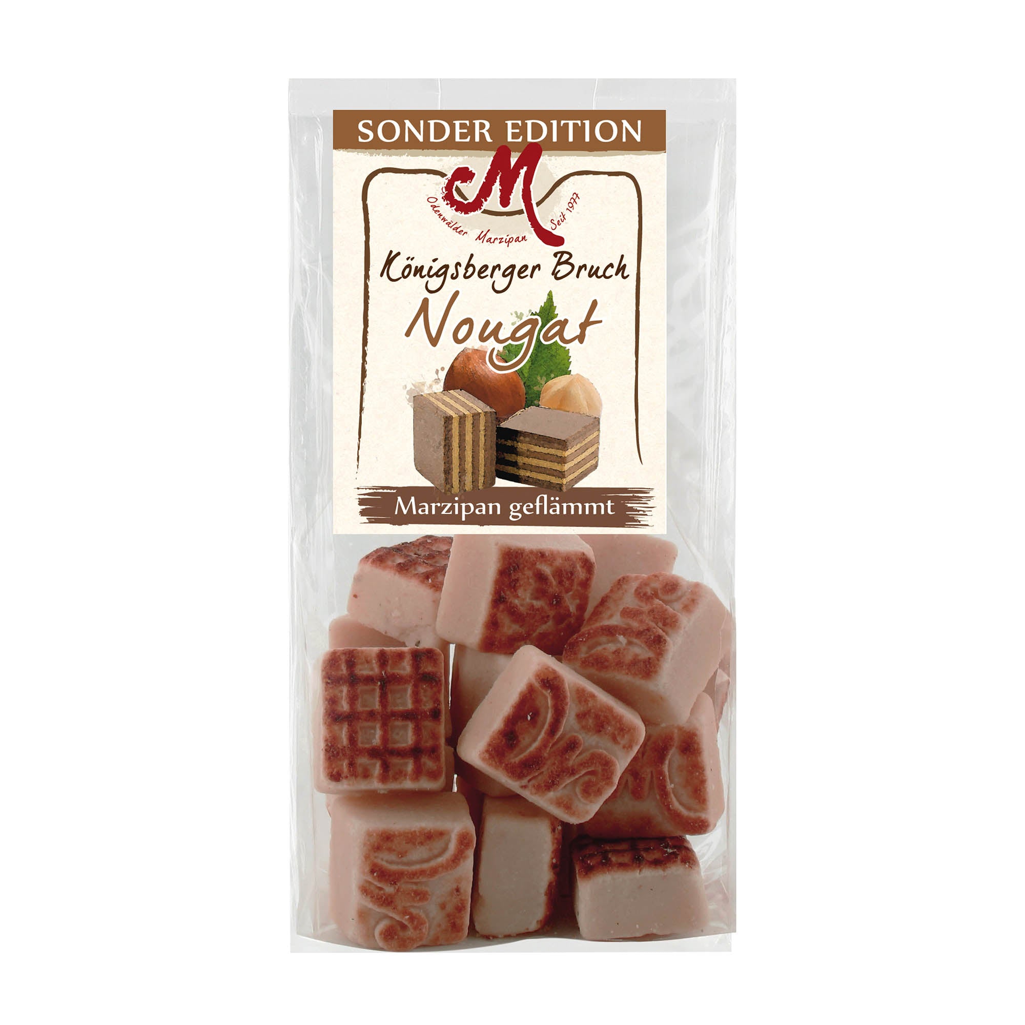 Packaging of Odenwaelder Koenigsberger Crunch nougat marzipan, showing the product name and images of the marzipan pieces.