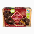 A 250g box of Lambertz Bio Organic Dark Chocolate Gingerbreads on a clean white background. The packaging is primarily red and gold, featuring images of chocolate-covered gingerbreads, and various certification logos on the right side.