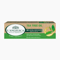 L'Angelica Tea Tree Oil Herbal Toothpaste in a rectangular cardboard box with a brown kraft background, green accents, and a tea tree illustration.