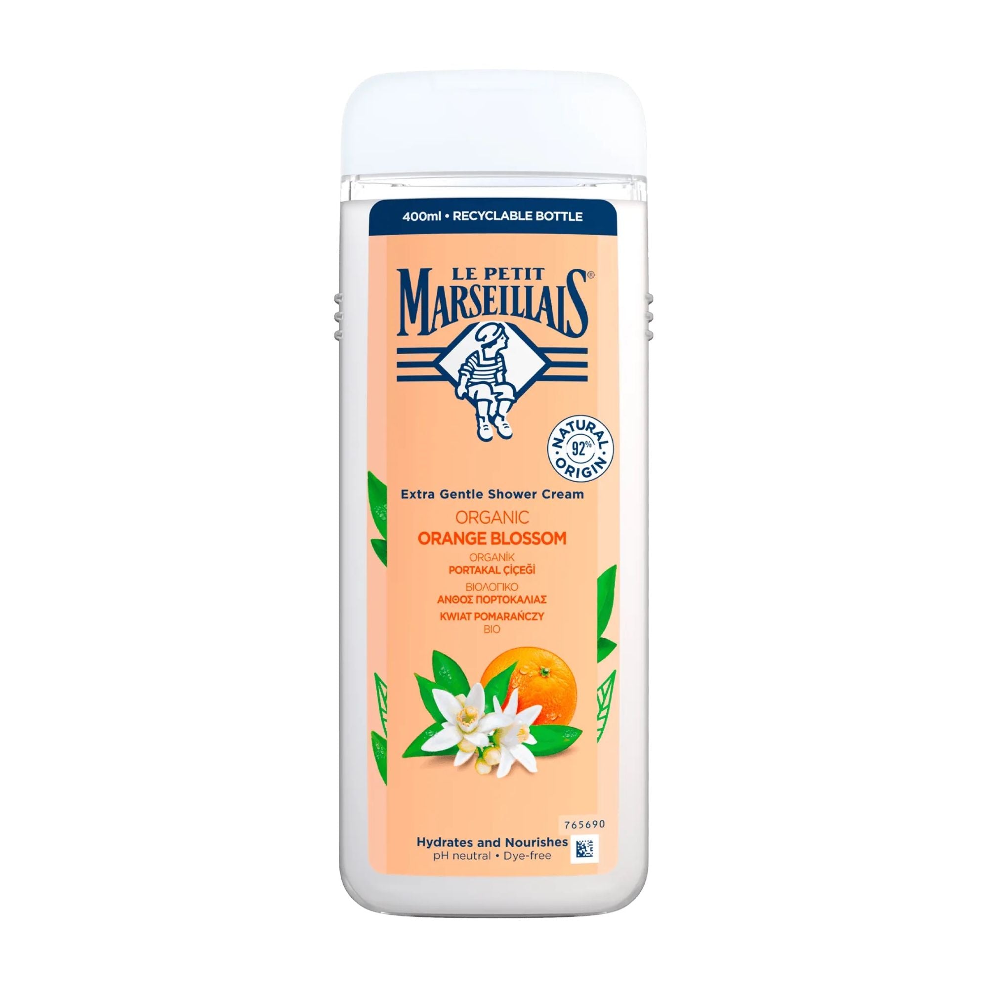 A plastic bottle of Le Petit Marseillais Organic Orange Blossom Shower Cream on a white background