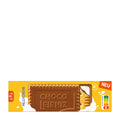 A package of Leibniz Choco Milk Cream biscuits on a plain white background. The packaging is bright yellow with a depiction of a chocolate-coated biscuit in the center, white splash graphics, and red accents including a 'TET' label.