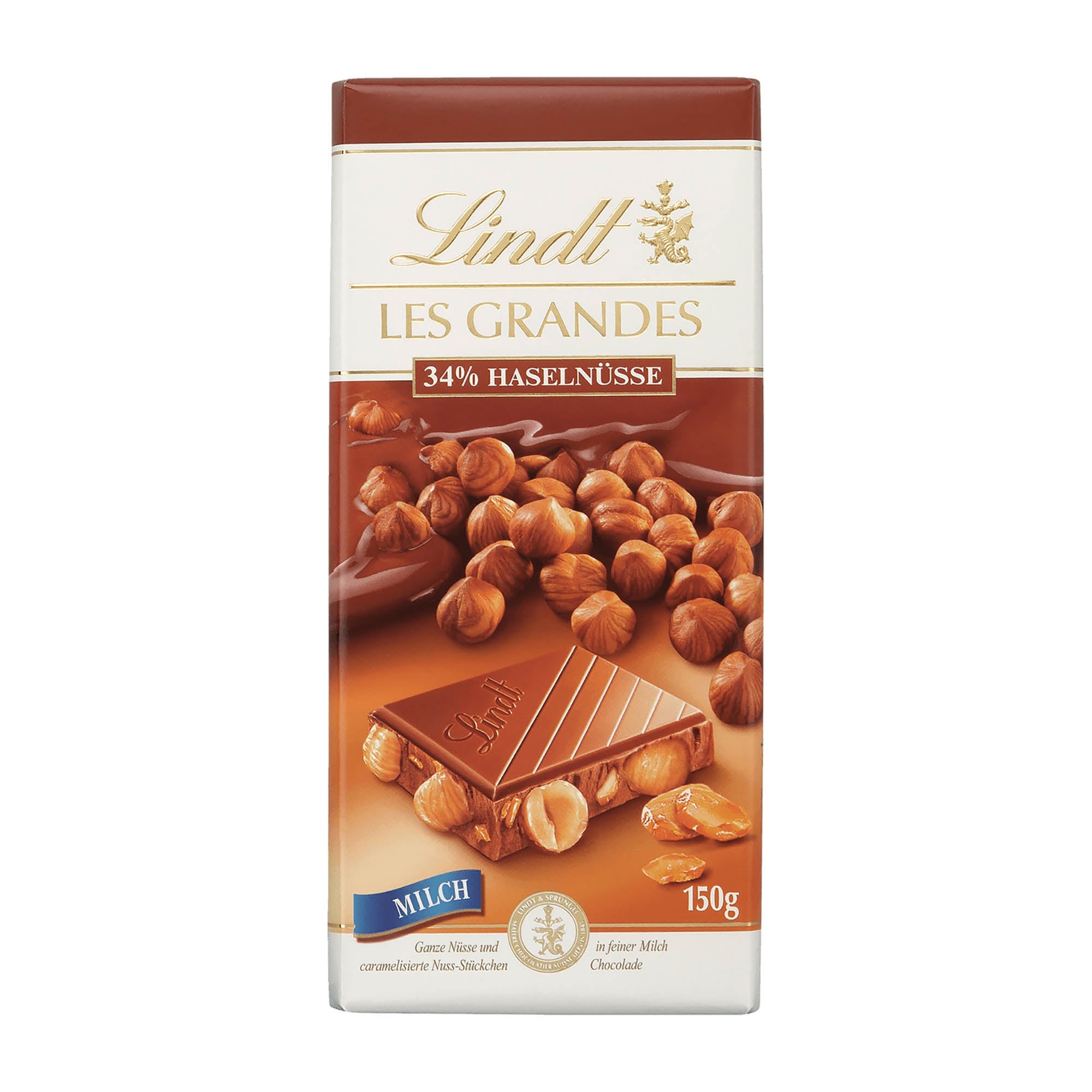 Packaging of Lindt Les Grandes 34% Hazelnut Milk Chocolate Bar, showing the bar and hazelnuts on a brown background.