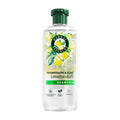 Herbal Essences Lime Scent Shampoo bottle on a white background.