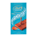 Packaging of Lindt Lindor caramel & salt milk chocolate bar, 100 g with visual of the chocolate bar and caramel pieces