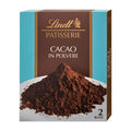 Lindt Patisserie cacao powder packaging with a pile of cacao powder on a white background.
